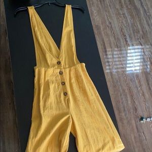 Yellow Overall . Stops right before your ankle.